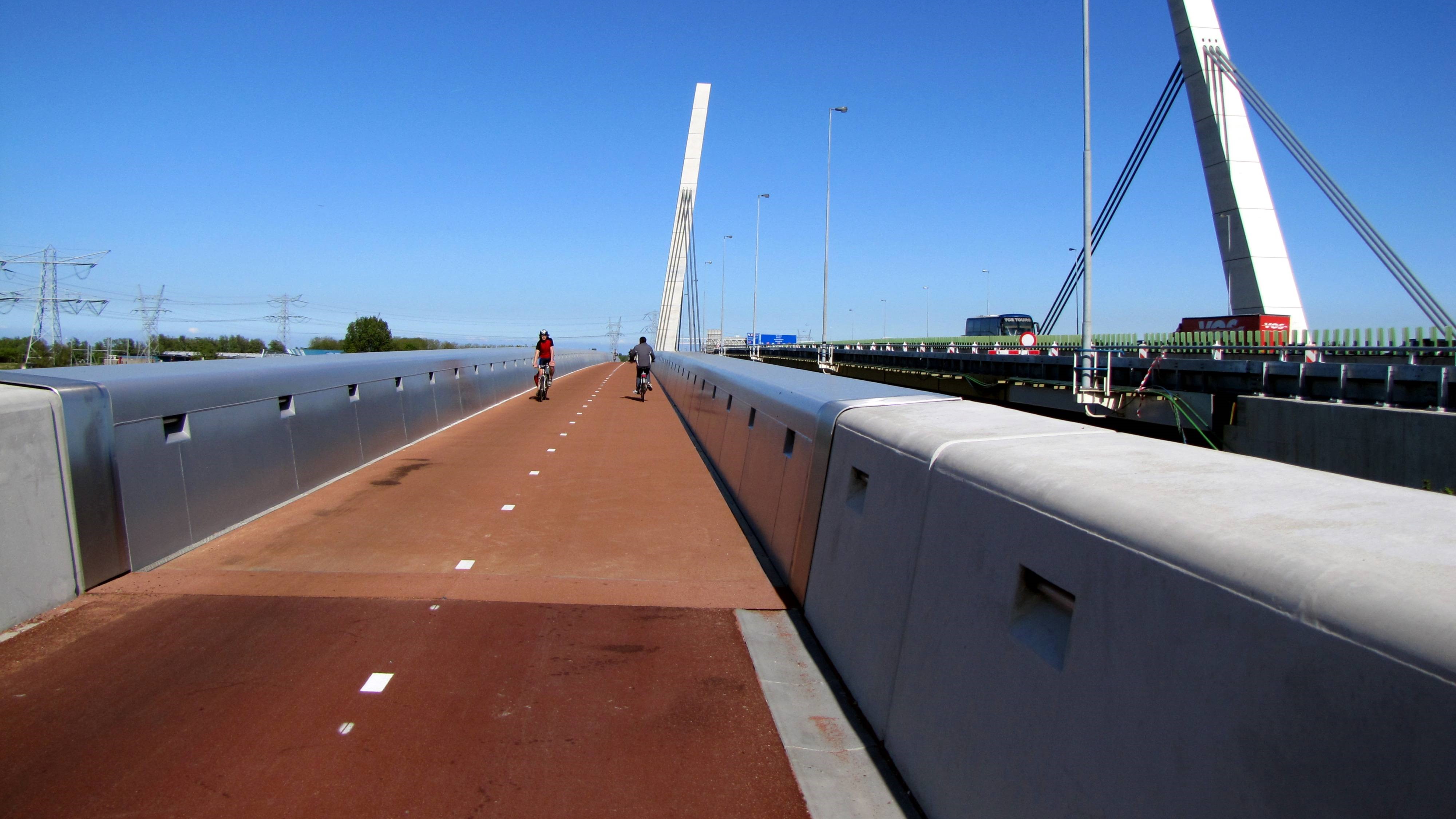 Muiderfietsbrug next to A1 motorway near Amsterdam.