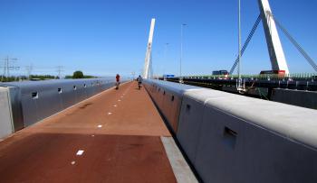 Muiderfietsbrug next to A1 motorway near Amsterdam.